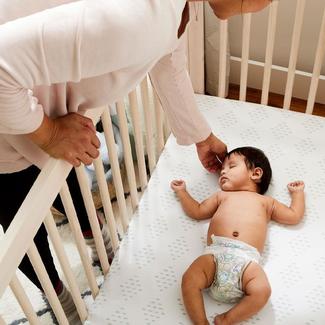 Baby sleeping in crib