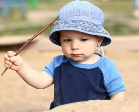 Toddler Playing in Sandbox